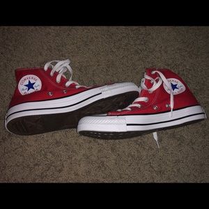 BRAND NEW red high top converse!!!